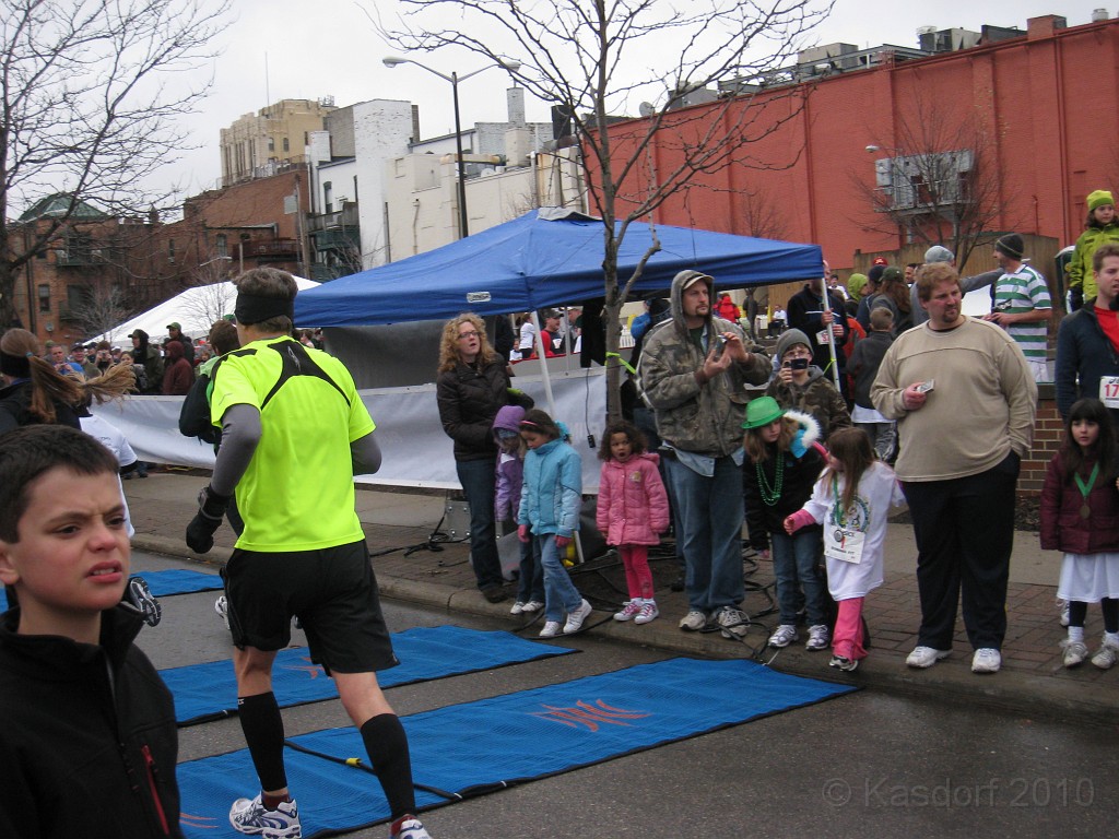 Shamrocks and Shenanigans 5K 2010 1130.jpg - The 2010 Shamrocks and Shenanigans 5K race in Ann Arbor MI. Cool and damp, and crowded. YES!! Foot on the mat, just keep going over both mats to be sure.